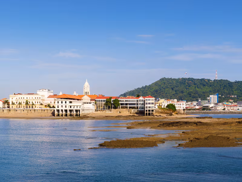 A panoramic view of a Panamanian town where the coastline meets the land — the kind of decision-defining view Panama is built around
