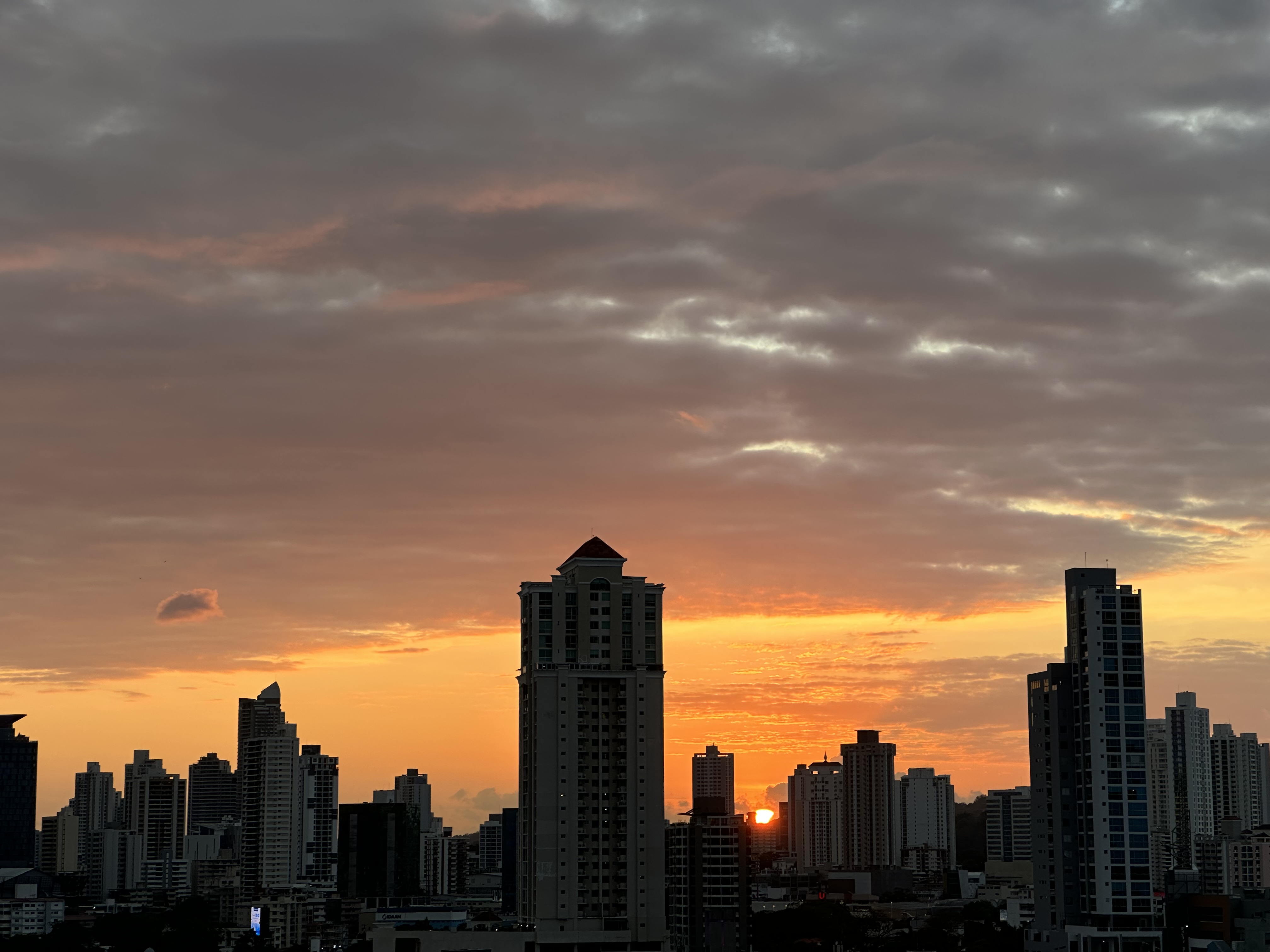 Panama City high-rise buildings glowing at dusk