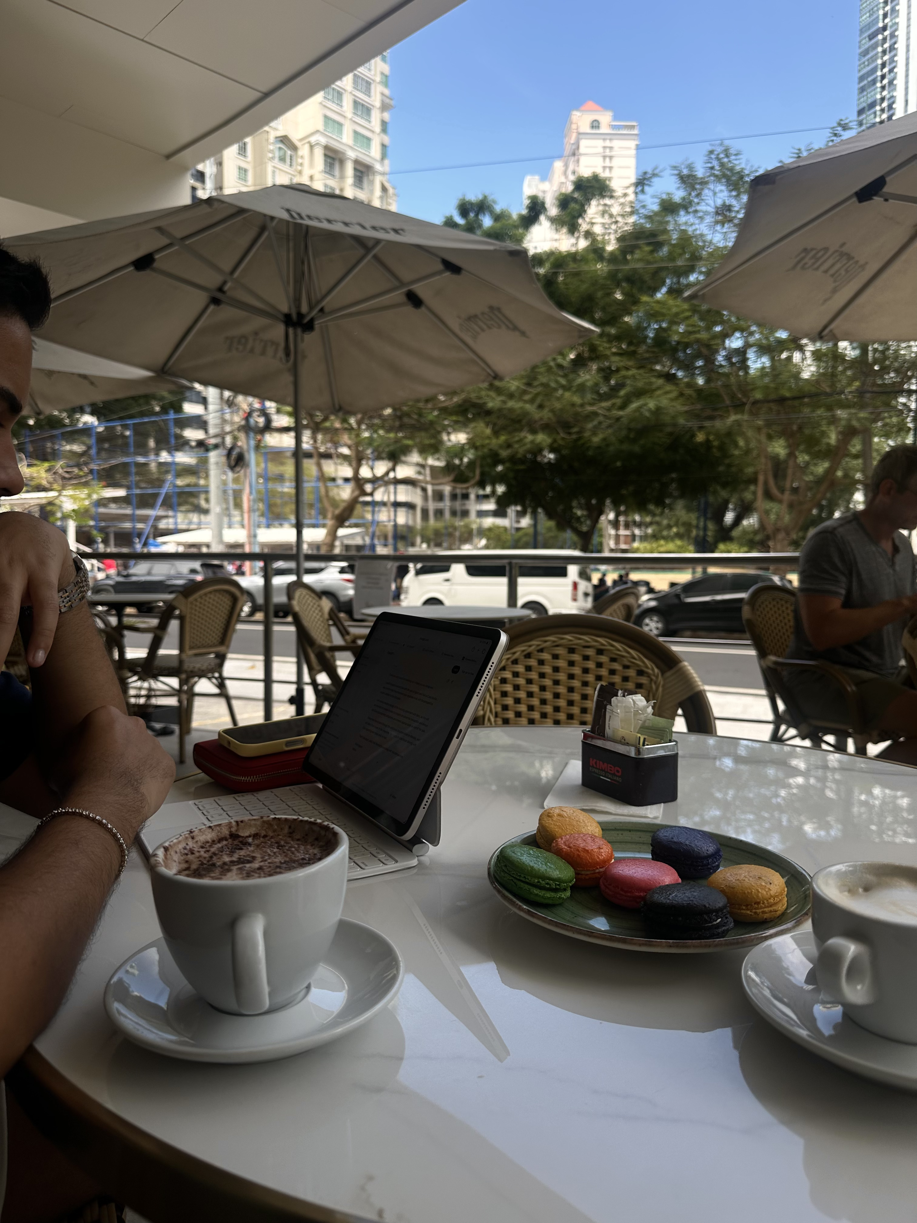 A remote worker at a café in Panama City — the kind of daily life that matters more than retiree-focused rankings when choosing where to live