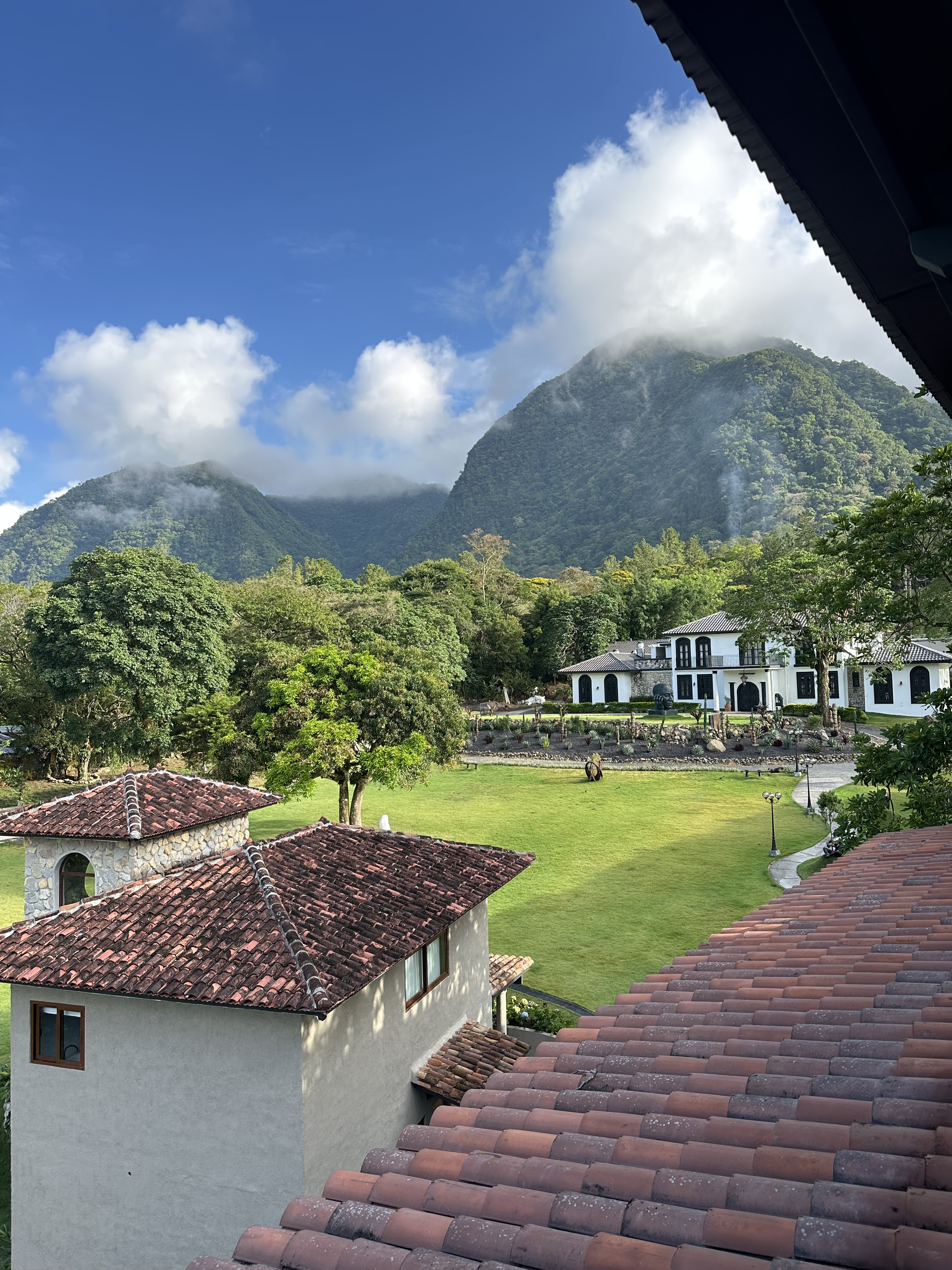 Misty green mountains around Boquete at dawn, capturing the cool highland climate that draws expats to mountain living in Panama